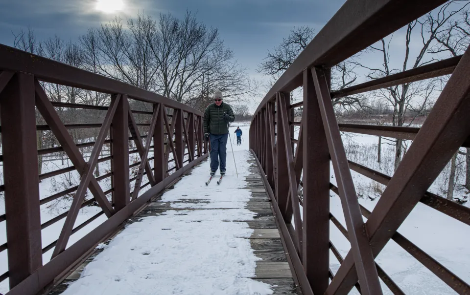 Experience Chester Woods Park with a candlelight hike on February 1, 2025
